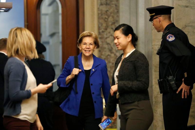 Sen. Elizabeth Warren was headed to Iowa after spending most of last week in Washington for President Donald Trump's impeachment trial.