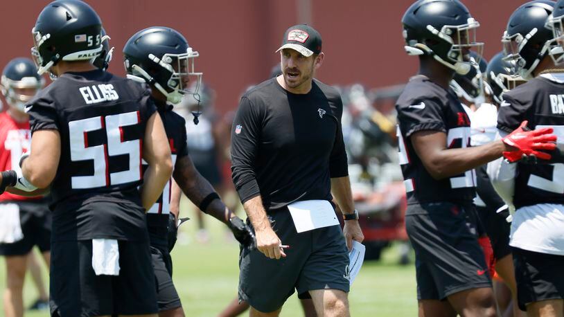 Falcons defensive coordinator Ryan Nielsen, center, instructs players during OTAs at the Atlanta Falcons Training Camp, Wednesday, June 7, 2023, in Flowery Branch, Ga. (Miguel Martinez / miguel.martinezjimenez@ajc.com)