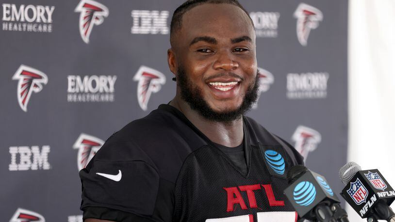 Falcons defensive tackle Grady Jarrett speaks to members of the media during training camp in Flowery Branch. Jarrett and his teammates will open their exhibition season Friday at Detroit. (Jason Getz / Jason.Getz@ajc.com)