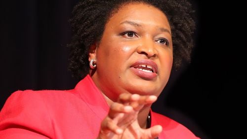 Democrat Stacey Abrams answers a debate question during a forum at The Carter Center in Atlanta. Curtis Compton/ccompton@ajc.com