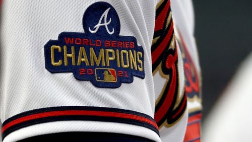 052322 Atlanta: The 2021 World Series Champions patch is shown on an Atlanta Braves player during their game against the Philadelphia Phillies at Truist Park Monday, May 23, 2022, in Atlanta. (Jason Getz / Jason.Getz@ajc.com)