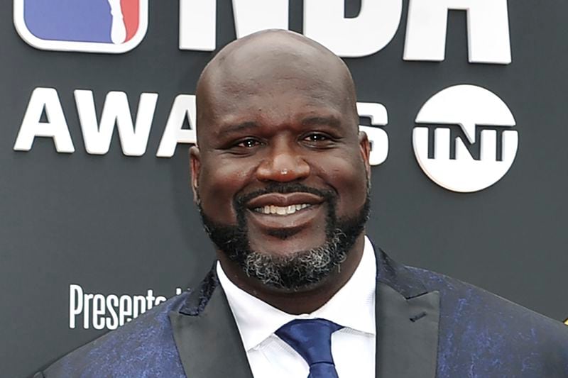 FILE - This June 24, 2019, file photo shows Shaquille O'Neal at the NBA Awards in Santa Monica, Calif. A woman whose car was left stranded along a Florida interstate when her tire blew out got a little unexpected help from former NBA star Shaquille O'Neal, sheriff's officials say. O'Neal, who lives in the Orlando area, was traveling on Interstate 75 near Gainesville on Monday, July 13, 2020, when he saw the woman pull onto the side of the road, the Alachua County Sheriff's Office said on a Facebook post. He stayed with the woman until deputies arrived at the scene. He fist-bumped Deputies Purington and Dillon before going on his way, the sheriff's office wrote on Facebook.  (Photo by Richard Shotwell/Invision/AP, File)