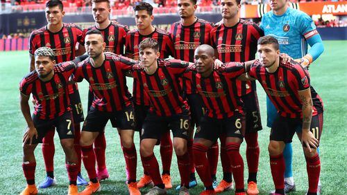 July 21, 2019 Atlanta: Atlanta United starters pose for a team photo taking the field to play D.C. United in a soccer match on Sunday, July 21, 2019, in Atlanta.   Curtis Compton/ccompton@ajc.com