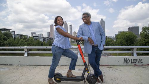 08/04/2021 —Atlanta, Georgia — AJC reporter Ernie Suggs and columnist Nedra Rhone pose for a portrait in Atlanta, Wednesday, August 4, 2021.  (Alyssa Pointer/Atlanta Journal Constitution)