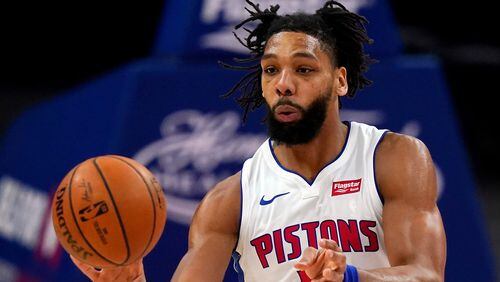 Detroit Pistons center Jahlil Okafor passes the ball during the first half of a preseason game Dec. 11, 2020, in Detroit. The Detroit Pistons acquired veteran center DeAndre Jordan in a multiplayer trade with the Brooklyn Nets on Saturday, Sept. 4, 2021. The Pistons also received four second-round picks and cash considerations from the Nets in exchange for forward Sekou Doumbouya and center Jahlil Okafor. (Carlos Osorio/AP)