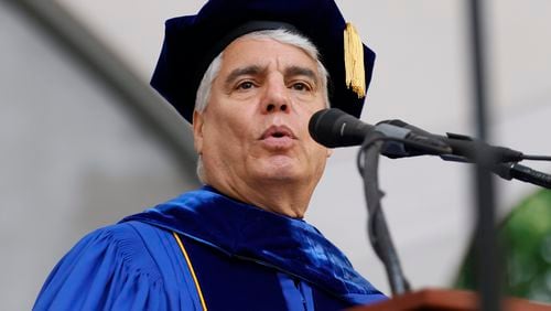 Emory's president, Gregory L. Fenves, delivers his presidential address to the graduates during Emory University's 2023 Commencement on Monday, May 8, 2023. Fenves said he was "saddened" and "horrified" after protests at the school Thursday. (Miguel Martinez /miguel.martinezjimenez@ajc.com)