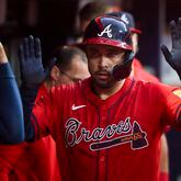 Atlanta Braves catcher Travis d'Arnaud celebrates after hitting a solo home run during the second inning against the Texas Rangers at Truist Park, Friday, April 19, 2024, in Atlanta. (Jason Getz / AJC)
