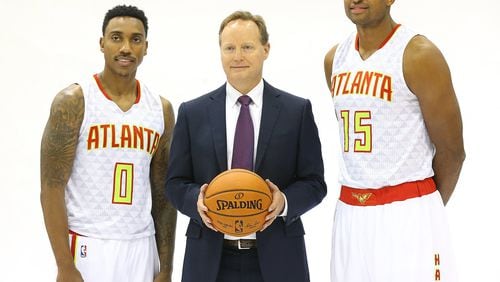 Jeff Teague (from left), head coach Mike Budenholzer, and Al Horford pose for a portrait during the team’s annual Media Day at the Philips Arena on Monday, Sept. 28, 2015, in Atlanta. Curtis Compton / ccompton@ajc.com