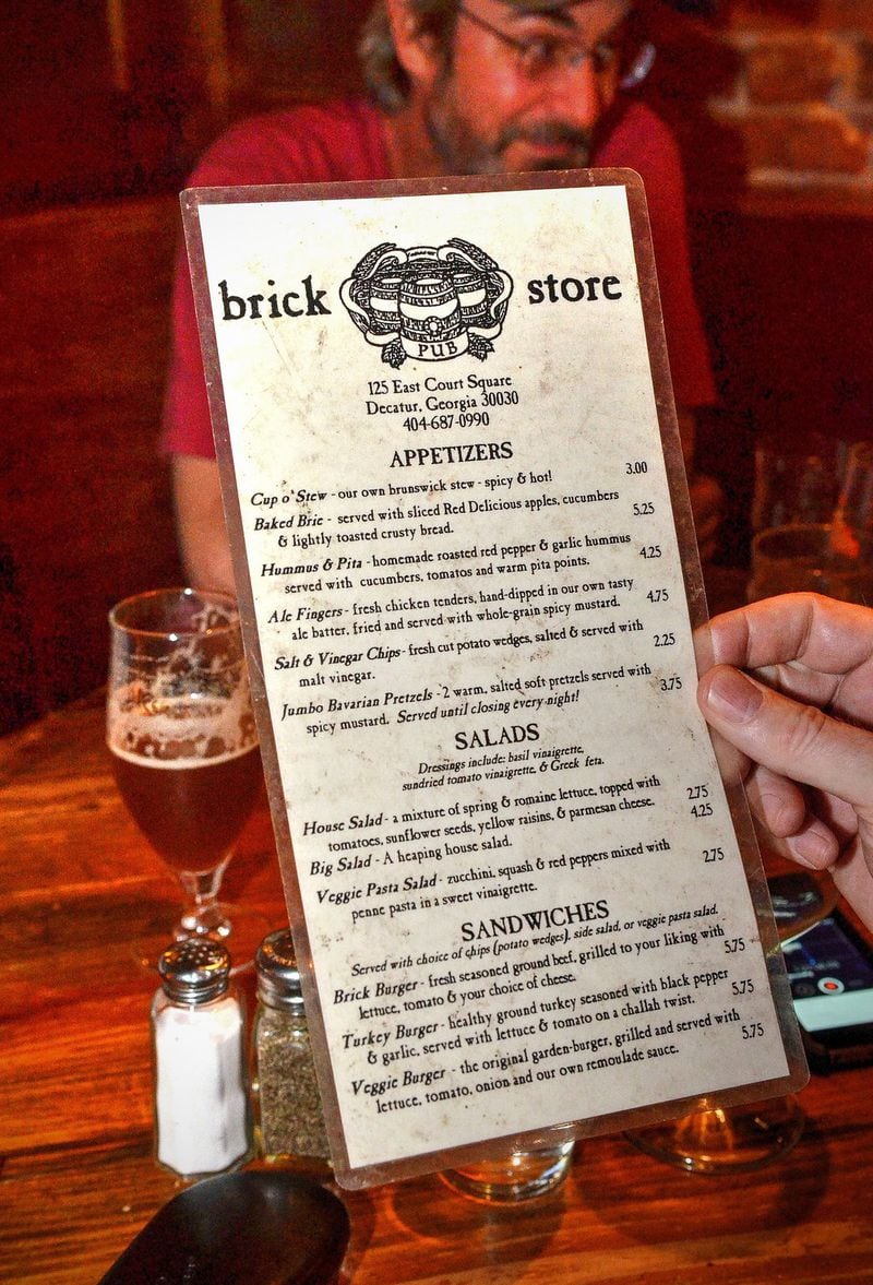 An original menu from the opening days 20 years ago shows the food offerings available at the time at the Brick Store Pub. CHRIS HUNT / SPECIAL