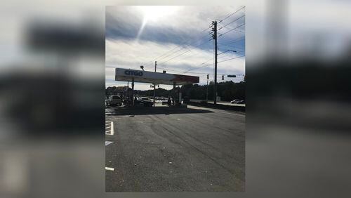 A man was found shot dead at this DeKalb County gas station.
