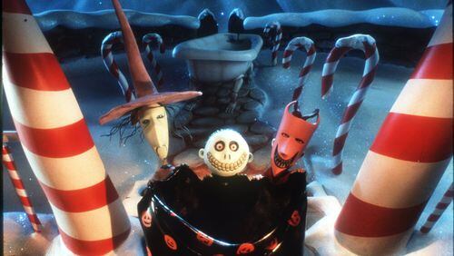 Lock (right), Shock (left), and Barrel (center) get ready to ‘bag’ the real Santa Claus so that the leader of Halloweentown, Jack Skellington, can take his place in Touchstone Pictures’ ‘Tim Burton’s The Nightmare Before Christmas.’ The movie is showing on Oct. 24 at Woodruff Park. ©Touchstone Pictures. All Right Reserved