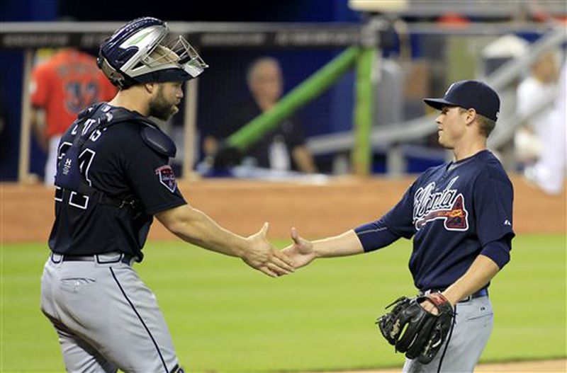 Atlanta Braves catcher Evan Gattis, left, congratulates relief pitcher Shae Simmons after they defeated the Miami Marlins 4-2 in a baseball game in Miami, Sunday, June 1, 2014. (AP Photo/Joe Skipper) Promising rookie Shae Simmons, being congratulated by catcher Evan Gattis after a game in Miami, has been thrust into immediate high-leverage situations in a bullpen that's not been up to its standards of recent seasons (AP photo)
