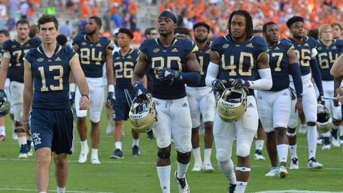 Georgia Tech players leave after they lost to the Clemson at Bobby Dodd Stadium on Saturday, September 22, 2018.  HYOSUB SHIN / HSHIN@AJC.COM