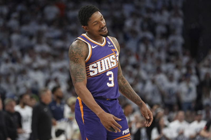 Phoenix Suns guard Bradley Beal reacts after missing on a dunk attempt during the first half of Game 2 of the team's NBA basketball first-round playoff series against the Minnesota Timberwolves, Tuesday, April 23, 2024, in Minneapolis. (AP Photo/Abbie Parr)