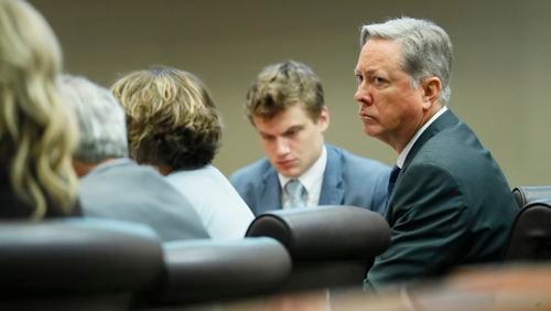 Former DeKalb County police officer Robert "Chip" Olsen (right) sits with his attorneys, including Lukas Alfen, during the start of jury pool questioning on Monday, September 23, 2019, in a DeKalb County Superior Court courtroom.  Bob Andres / robert.andres@ajc.com