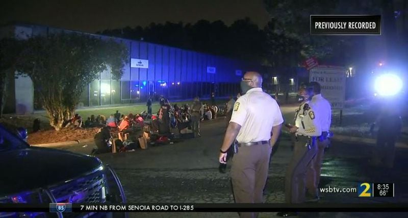 More than 60 "shoppers" were detained Friday after police raided a South Fulton warehouse and seized large quantities of drugs, authorities said.