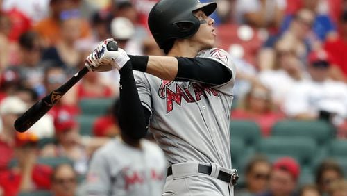 Christian Yelich has drawn interest from multiple teams including the Braves, who could improve their defense and lineup significantly by trading for the Marlins outfielder. (AP Photo/Jeff Roberson)