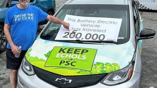 On Saturday, April 20, Steve Epstein reached 250,000 miles on his Chevy Bolt. He adjusted the sign with a black marker. Epstein has been a ride-share driver for almost a decade. He thinks EVs are a great option for those in the ride-sharing industry. Image Credit: Steve Epstein