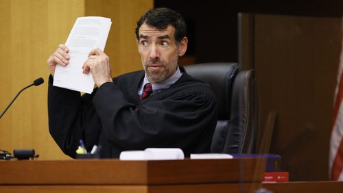 Fulton County Superior Court Judge Robert McBurney reacts to arguments by D.A. Fani Willis during a Jan. 24, 2023 hearing over whether to release the final report of a special grand jury. Miguel Martinez / miguel.martinezjimenez@ajc.com