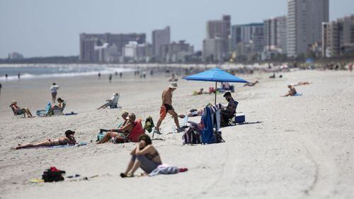 People who flock to North Myrtle Beach, South Carolina, for the holiday will be required to wear masks in certain places.