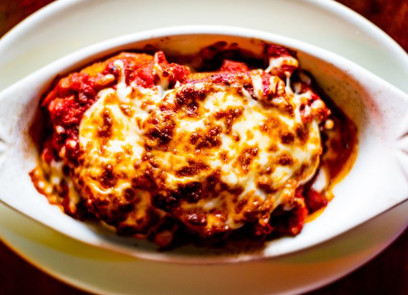 The eggplant parmigiana at Scalini’s Italian Restaurant is believed by many to help pregnant women go into labor. CONTRIBUTED BY HENRI HOLLIS