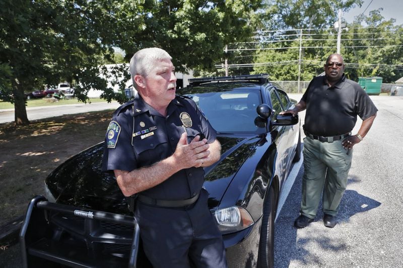 August 8, 2019, 2019 - Griffin - Griffin Police Chief Mike Yates (left) and Captain Homer Daniel, are lobbying the state parole board to release a man, Eric Ferrell, who was convicted of killing a pregnant woman. In three decades of police work, the chief says he’s never met an inmate, a convicted killer no less, whose cause he would take up. Bob Andres / robert.andres@ajc.com