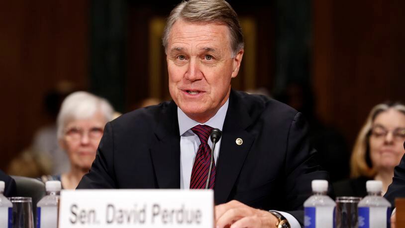 Former U.S. Sen. David Perdue formally launched his candidacy for governor on Monday with a video taking aim at both Gov. Brian Kemp, a fellow Republican, and Democrat Stacey Abrams. (AP Photo/Alex Brandon)