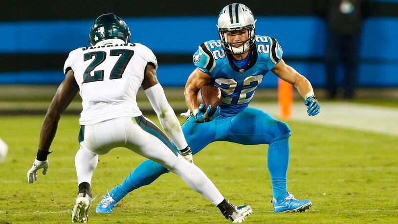 Oct 12, 2017; Charlotte, NC, USA; Carolina Panthers running back Christian McCaffrey (22) runs after a catch against Philadelphia Eagles strong safety Malcolm Jenkins (27) in the fourth quarter at Bank of America Stadium. Mandatory Credit: Jeremy Brevard-USA TODAY Sports ORG XMIT: USATSI-358921 ORIG FILE ID: 20171012_lbm_bb4_174.JPG