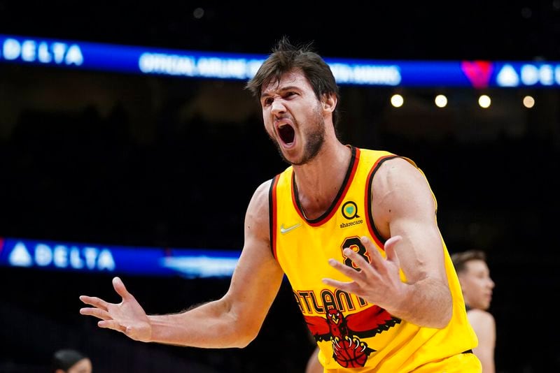 Atlanta Hawks forward Danilo Gallinari (8) reacts after being charged with a foul during the first half of an NBA basketball game against the Miami Heat Wednesday, Jan. 12, 2022, in Atlanta. (AP Photo/John Bazemore)