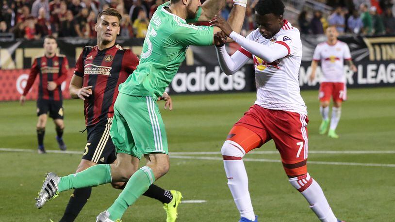 March 5, 2017, Atlanta: Atlanta United RC N.Y. goalkeeper Alec Kann blocks a shot by Red Bulls Derrick Etienne Jr. during the second half in the first game in franchise history on Sunday, March 5, 2017, in Atlanta. Curtis Compton/ccompton@ajc.com