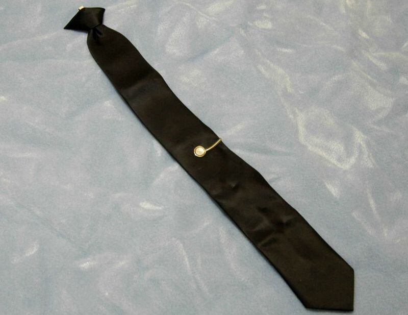 Pictured is the clip-on tie that the hijacker calling himself "Dan Cooper" left behind after he parachuted from Northwest Orient Flight 305 on a cold night in November 1971. The tie is one of few pieces of evidence that Cooper left behind.