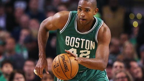 BOSTON, MA - OCTOBER 26: Al Horford #42 of the Boston Celtics drives against the Brooklyn Nets during the first quarter at TD Garden on October 26, 2016 in Boston, Massachusetts. NOTE TO USER: User expressly acknowledges and agrees that, by downloading and/or using this photograph, user is consenting to the terms and conditions of the Getty Images License Agreement. (Photo by Maddie Meyer/Getty Images)