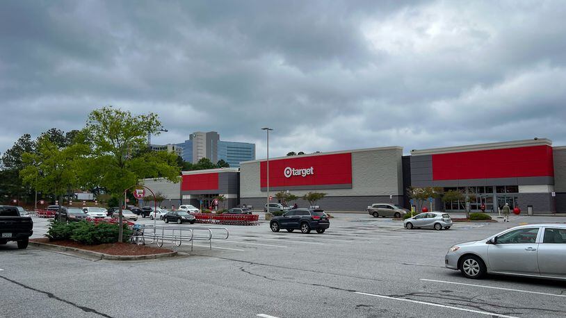A Target store on North Druid Hills Road was closed temporarily Thursday afternoon after someone set fire in one of the dressing rooms, Brookhaven police said.