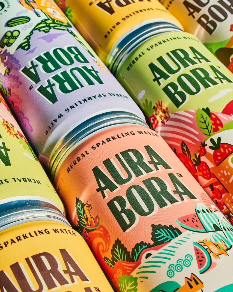Cans of Aura Bora's sparkling water are filled with uncommon combinations of plant-based ingredients. Courtesy of Maria Be