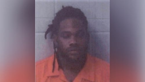 Marquez Smith is accused of shooting and killing the mother of his 15-year-old daughter and the mother's boyfriend during a custody exchange Sunday evening, according to the Newton County Sheriff's Office.