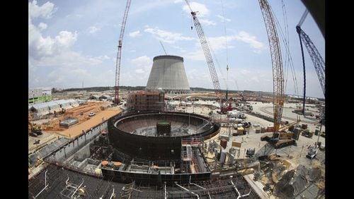<p>
              FILE- This June 13, 2014, file photo, shows construction on a new nuclear reactor at Plant Vogtle power plant in Waynesboro, Ga. A group of Georgia lawmakers wants a “cost cap” in the construction of a nuclear power plant near Augusta to protect blown budgets from being passed on to consumers. Two reactors being built at Plant Vogtle are billions of dollars over budget. (AP Photo/John Bazemore, File)
            </p>