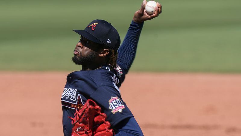 Atlanta Braves starting pitcher Touki Toussaint delivers a pitch in the third inning against the Boston Red Sox Monday, March 1, 2021, in Fort Myers, Fla. (Brynn Anderson/AP)