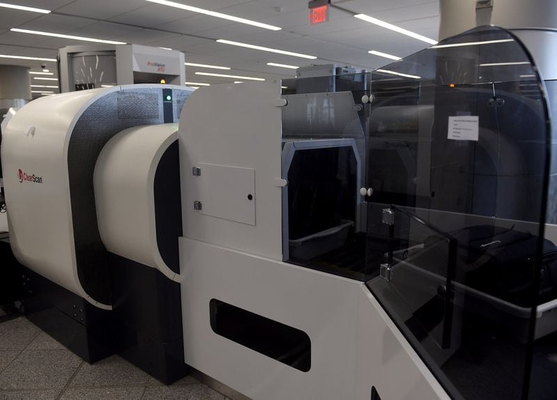 June 5, 2019 Atlanta - Two new TSA smart lanes at the international terminal at Hartsfield-Jackson are aimed at making it easier for travelers to get through screening. The new lanes are equipped with CT machines, which allow passengers to keep all items in their bags instead of removing them and putting them into bins. Travelers can keep laptops, ipads and quart bags of permitted liquids in their bags when the bags go through screening. The second-generation smart lanes allow four travelers to load bins at a time, allowing some to take longer to load bins while other move forward through the line. RYON HORNE/RHORNE@AJC.COM