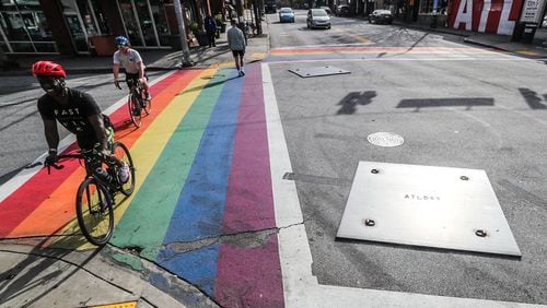 Metal plates installed at rainbow crosswalks to stop drivers from doing doughnuts