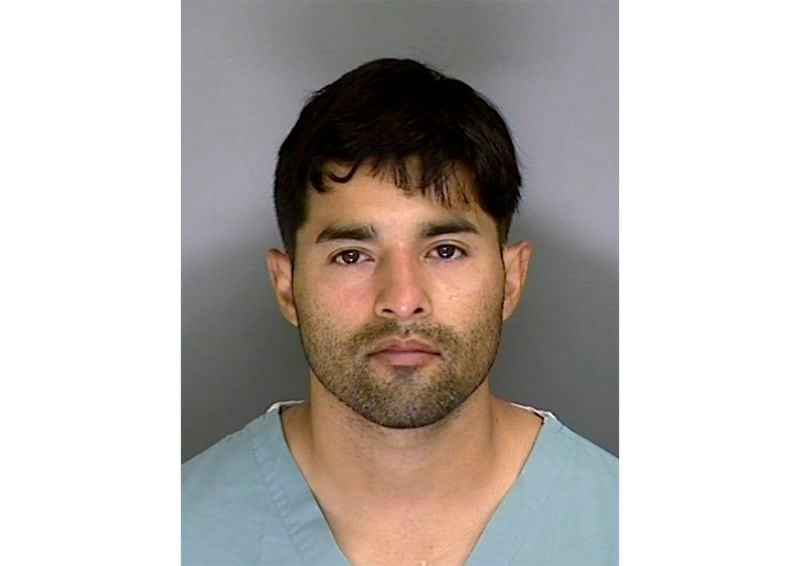 This  booking photo from the Santa Cruz County Sheriff's Office shows 32-year-old suspect Steven Carrillo. The Air Force sergeant already jailed in the ambush killing of a California sheriff's deputy was charged June 16 in the shooting death of a federal security officer outside the U.S. courthouse in Oakland during a protest last month.