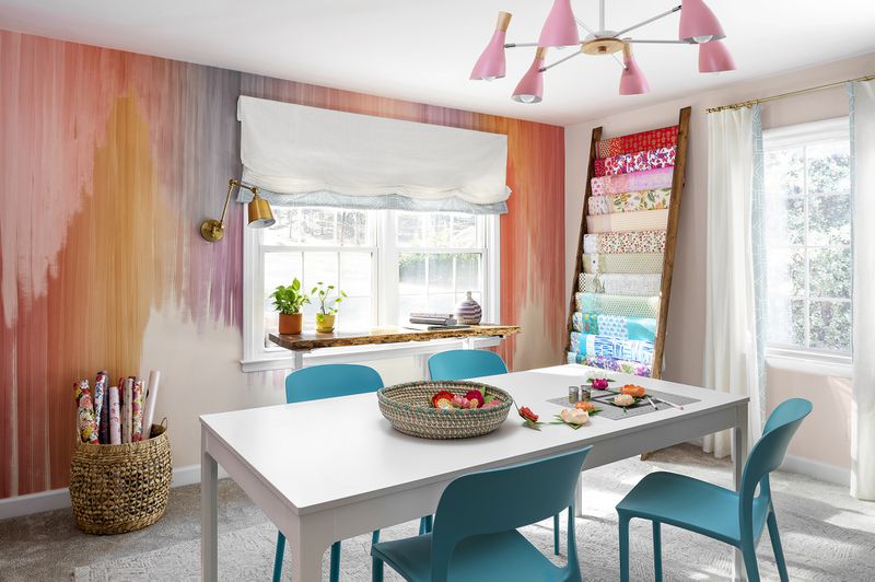 Bright, juicy colors including pink and cantaloupe give this home office a feminine air.
(Courtesy of Cati Teague Photography for Gina Sims Designs)