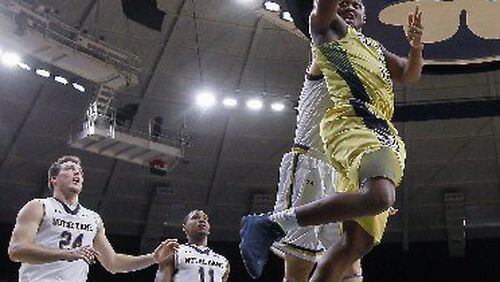 Georgia Tech Charles Mitchell scored 14 points to go with 12 rebounds for his fourth double-double of the season. Through Saturday's games, he was 11th in the country in offensive rebounds per game at 3.86. (ASSOCIATED PRESS)