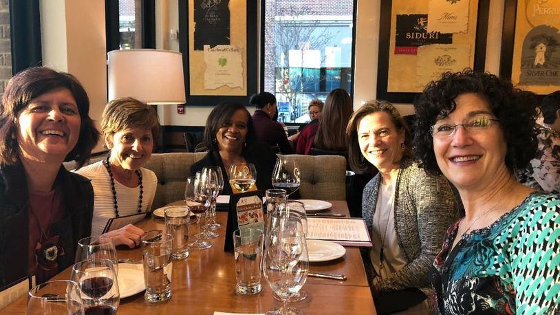 Gail Collier-Glover (center) enjoys a happy hour outing with other members of the Transition Network: (from left) Lynn Anderson, Alyse Pribish, Bonnie Cole and Debbie Cohen Levy. CONTRIBUTED