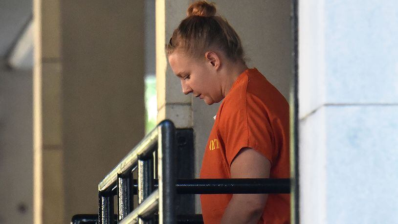 June 8, 2017 Augusta - Reality Leigh Winner leaves Federal Justice Center after she was denied bond during a hearing on Thursday, June 8, 2017. HYOSUB SHIN / HSHIN@AJC.COM