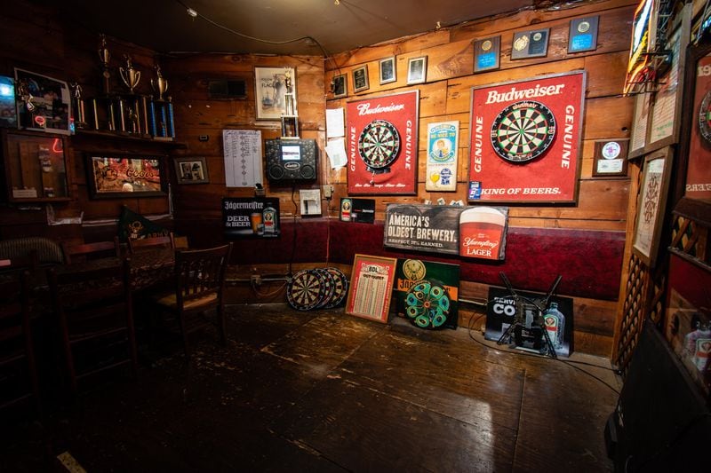 The darts room at the Rusty Nail is one of the few areas of the bar with bright lighting. CONTRIBUTED BY HENRI HOLLIS