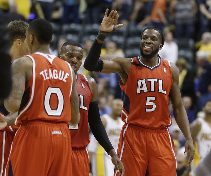 Atlanta Hawks' DeMarre Carroll (5) celebrates with his teammates late in the second half in Game 5 of an opening-round NBA basketball playoff series against the Indiana Pacers Monday, April 28, 2014, in Indianapolis. Atlanta defeated Indiana 107-97. (AP Photo/Darron Cummings) The happy Hawks celebrate a Naptown beatdown. (Darron Cummings/AP)