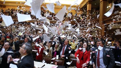 March 28, 2013 - Atlanta, Ga: Paper flies in the air after House Majority Leader Larry O'Neal, R-Bonaire, (not pictured) said, "Sine Die," to signify the end of Legislative Day 40 in the House Chambers at the Capitol Thursday night in Atlanta, Ga., March 28, 2013. Thursday is the last day of the 2013 Legislative Session. JASON GETZ / JGETZ@AJC.COM A scene from the final day of the 2013 Georgia Legislature, when lawmakers let the papers fly. AJC Political Insider helps reader sift and sort the world of Georgia politics, politicians and elections.