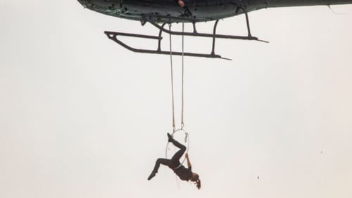 Aerialist Erendira Wallenda hangs beneath a helicopter during a stunt over the Horseshoe Falls at Niagara Falls, New York on Thursday.