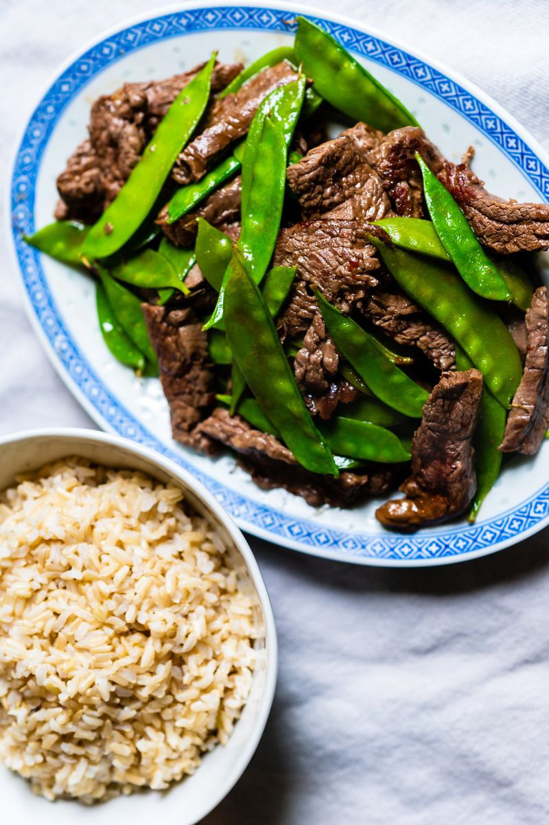 Beef and Snow Pea Stir-Fry comes together quickly after you assemble your ingredients. CONTRIBUTED BY HENRI HOLLIS