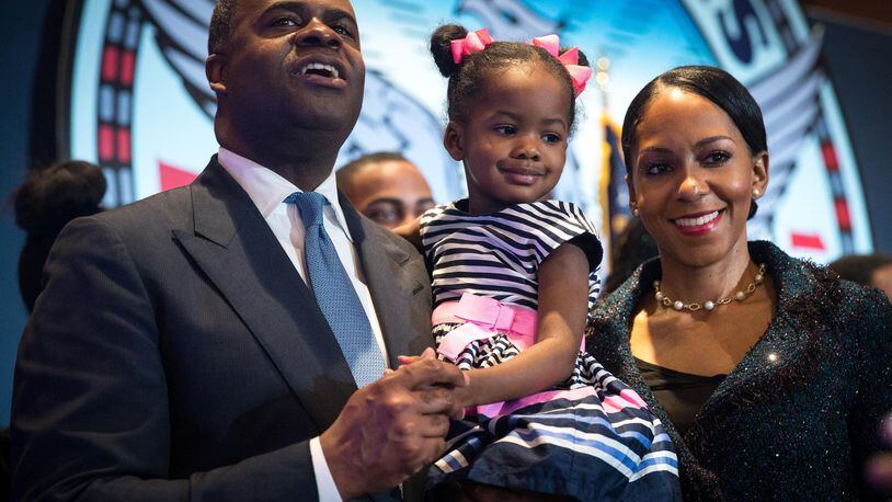 Atlanta Mayor Kasim Reed and his family pose for pictures following the “State of the City Address” at the Atlanta Marriott Marquis, Thursday, Feb. 2, 2017, in Atlanta. BRANDEN CAMP/SPECIAL